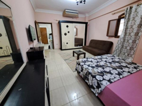 2-bedrooms Apartment with quiet sitting area in front of it
